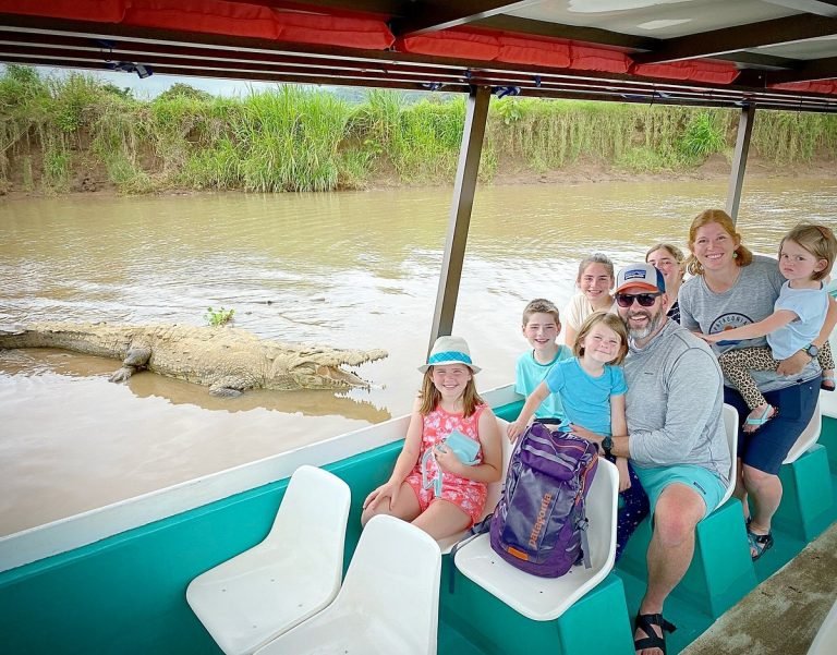 Family with kids on the Crocodile Tour boat on the Tárcoles River near Jaco, Costa Rica