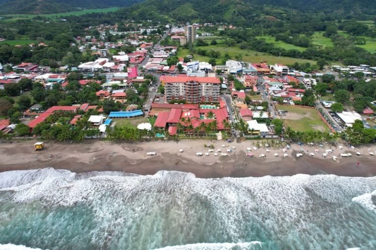 Aerial drone view of Jaco Beach and town, Costa Rica
