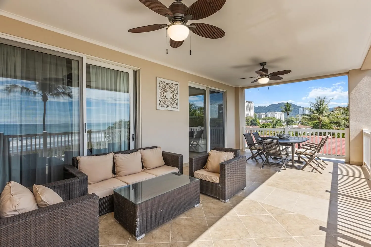 Balcony seating with mountain views at The Palms 404