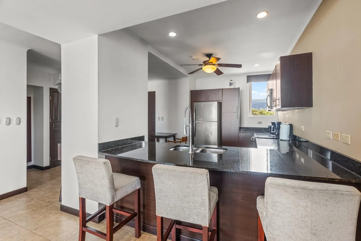 Breakfast bar with stools at The Palms 404