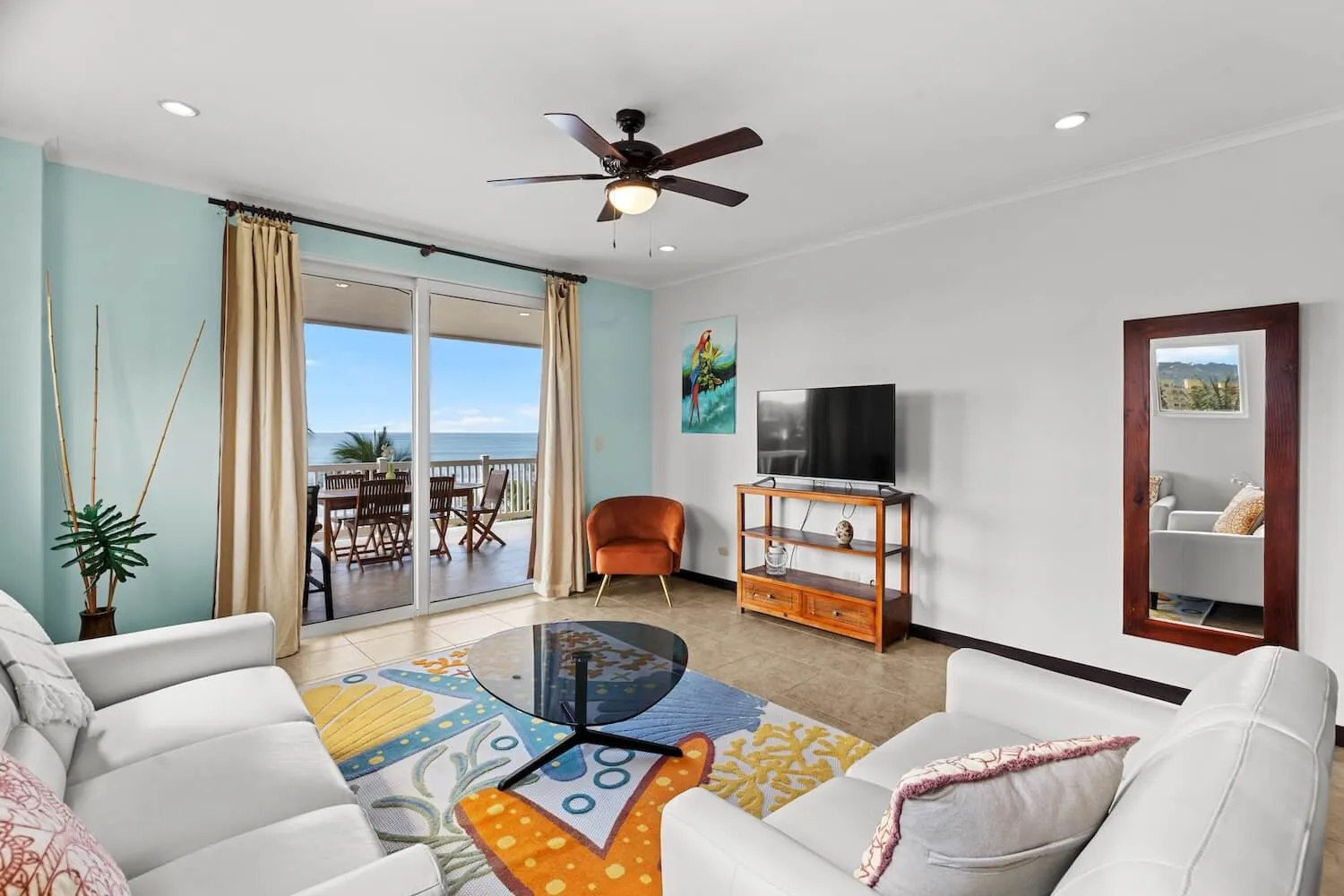 Living room at The Palms 504 opening onto the balcony
