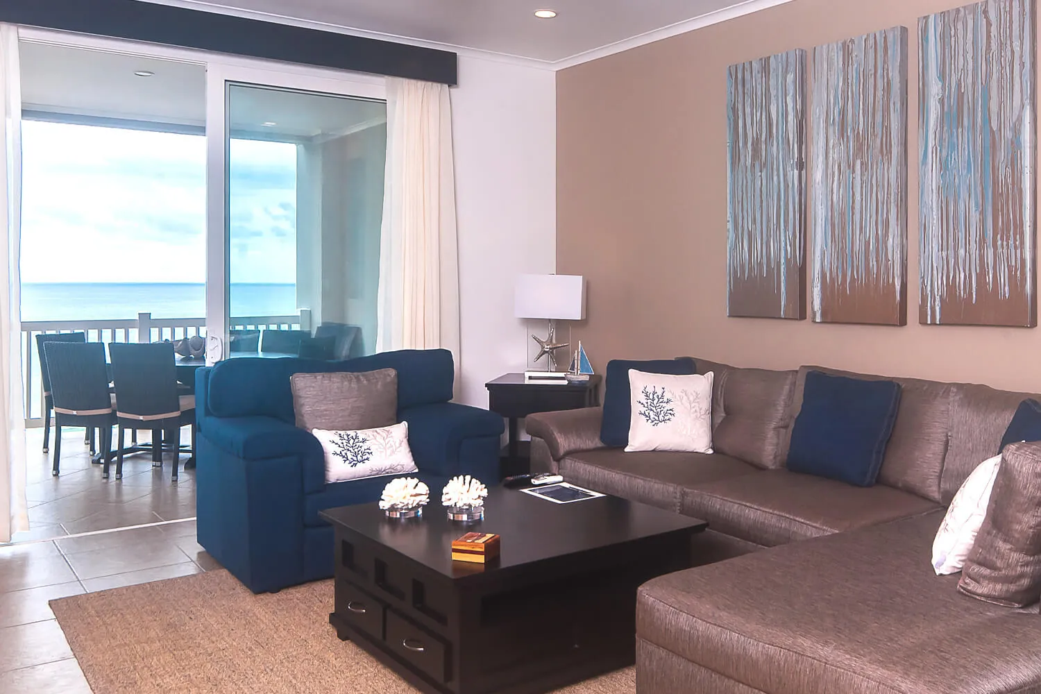 View from the living room of The Palms 902 to the balcony dining table
