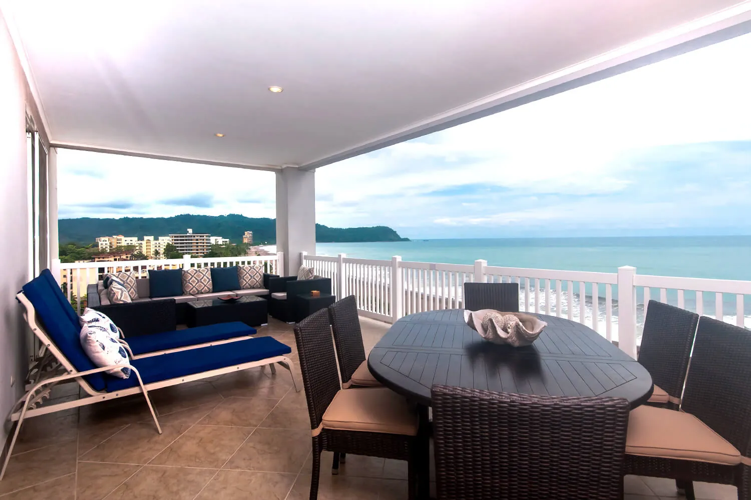 Ocean-view balcony with lounge set on the ninth floor of The Palms