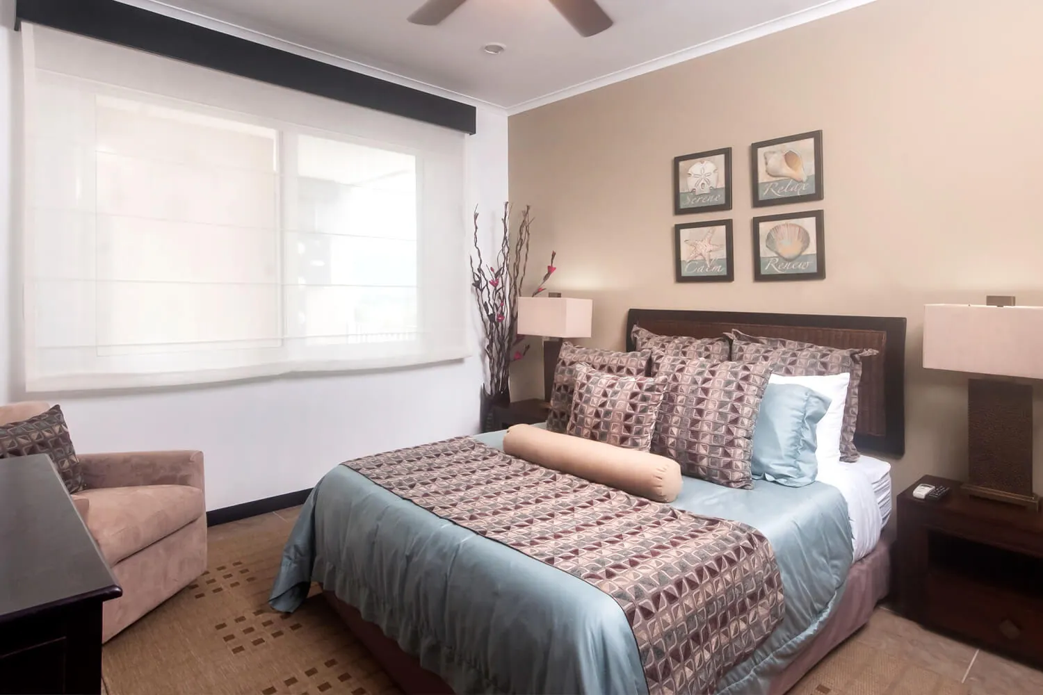 Third bedroom at The Palms 902 with a queen bed and a single bed